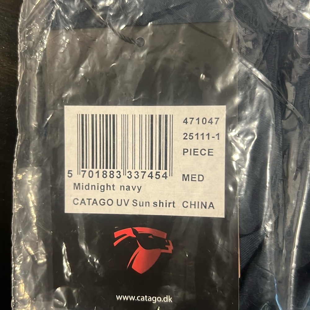 Navy and gray Catago sun shirt.